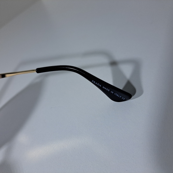 Prada Black Frame Sunglasses with Gold Temple Accents - Picture 7 of 12